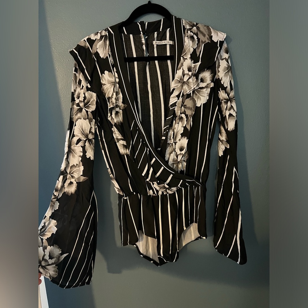 Novella Royale Bodysuit. Worn once. I believe it was around $150. Asking $60